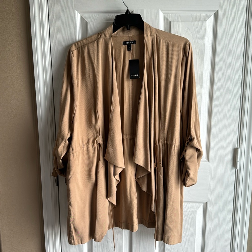 NWT- Woman’s Torrid Tan drape front utility jacket with roll tab sleeves.